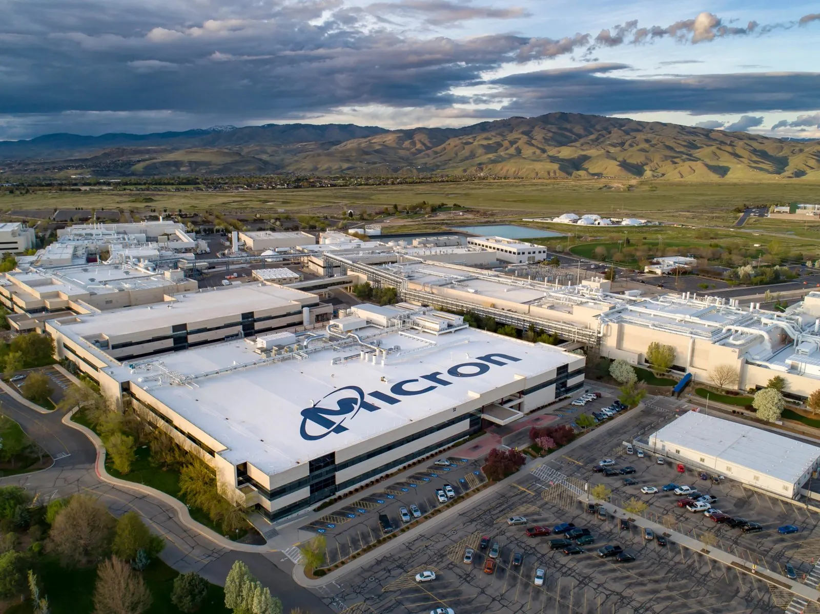 Aerial view of Micron's Boise campus with the foothills behind